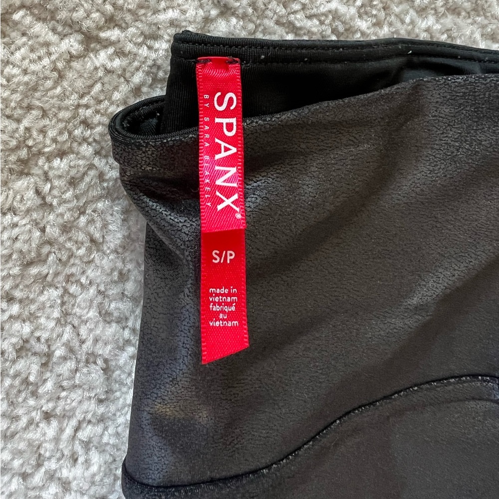 Spanks faux leather leggings